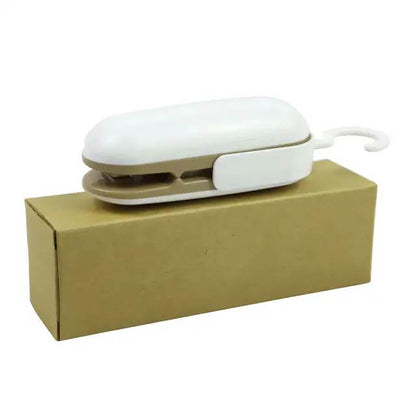 Mini Aspirateur Thermique 2 en 1 – Scelleur et Découpeur de Sacs Plastiques avec Crochet